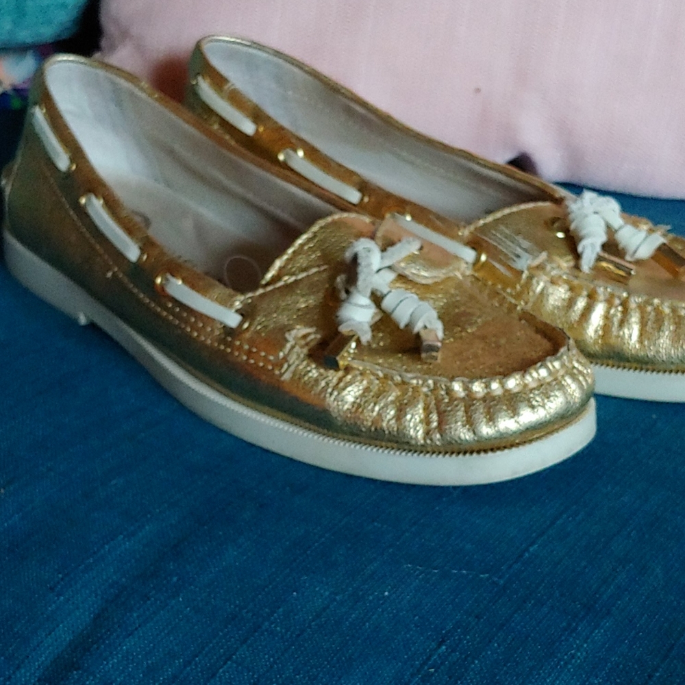 Michael Kors gold boat shoe